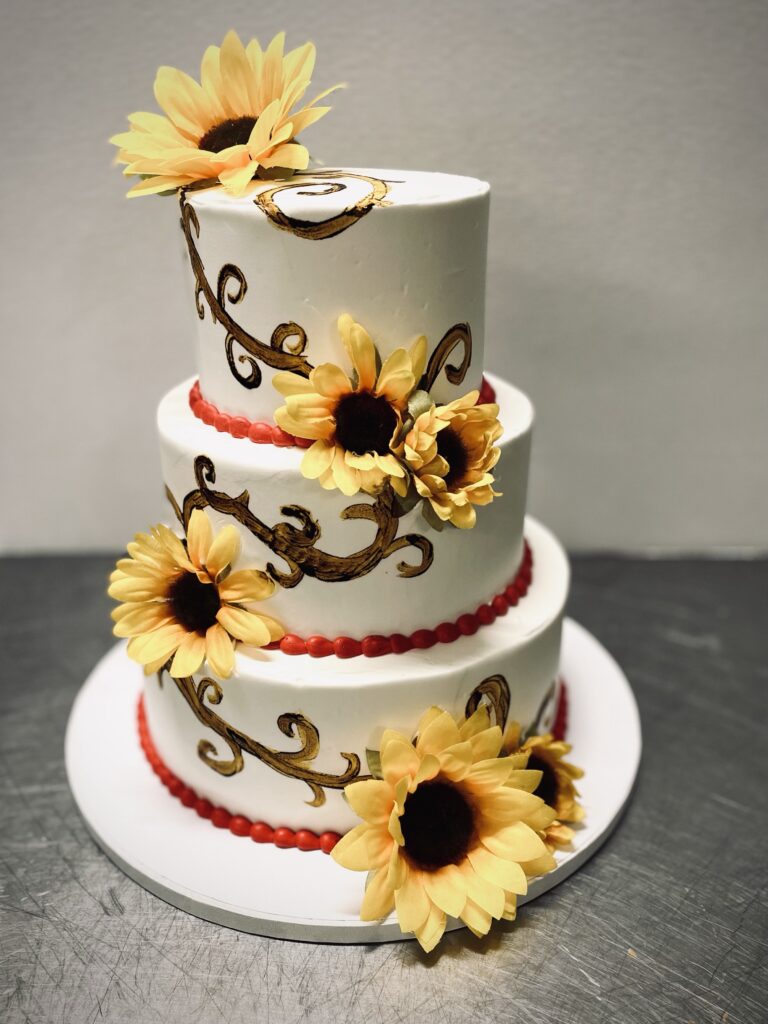 Two layer cake with sunflowers